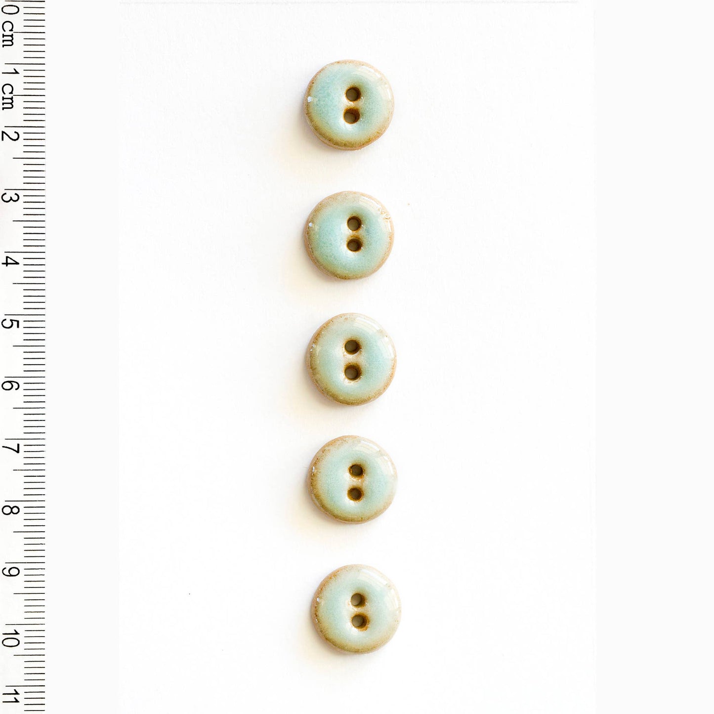 L574 Shiny Turquoise Buttons
